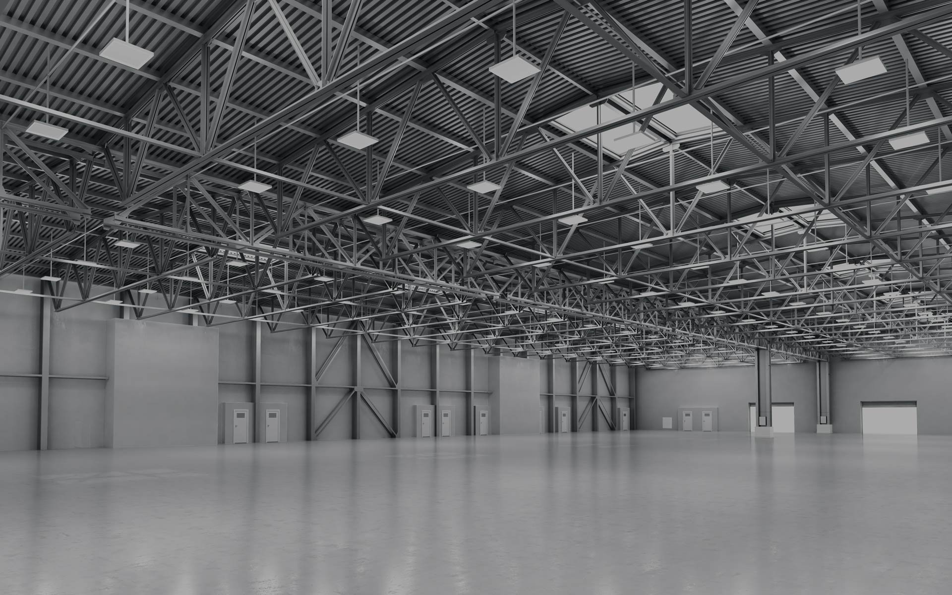 Photo of large empty warehouse with clean floors.