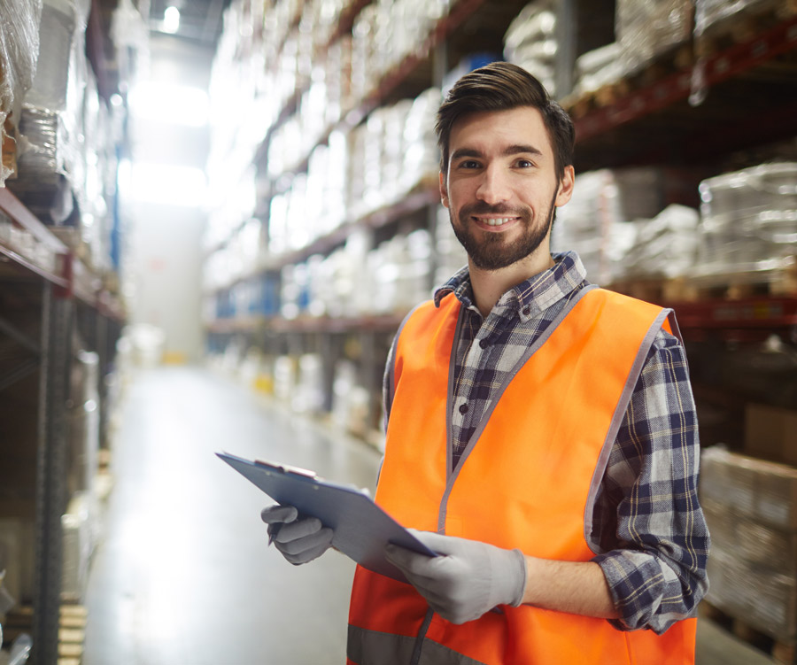Photo of a happy warehouse worker.